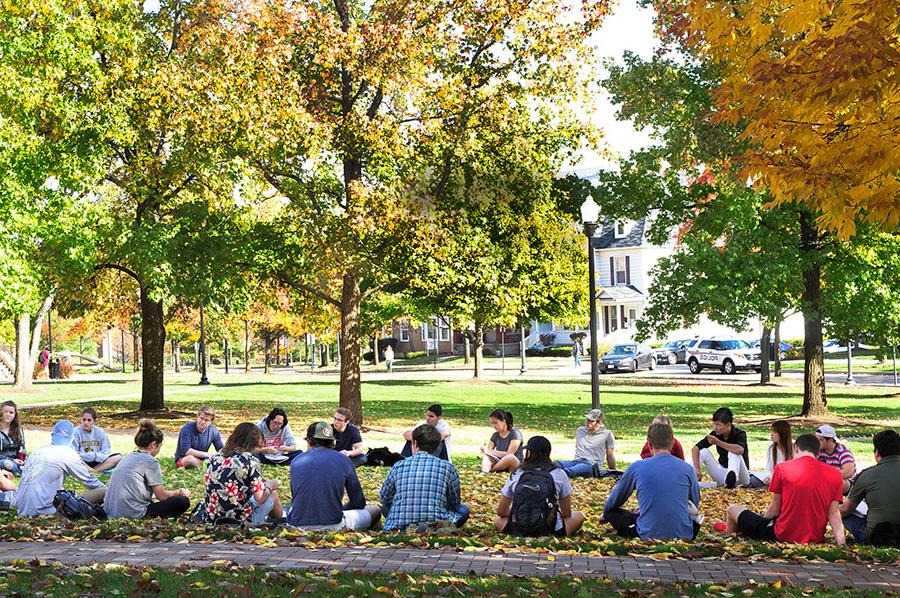 ${ Class outside on UD's campus }